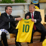 Trump e Bolsonaro sorrindo
